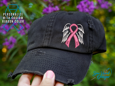 cancer ribbon with wings hat