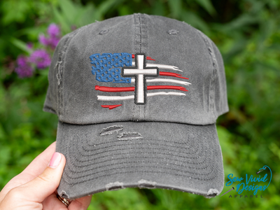 distressed American flag with a cross hat